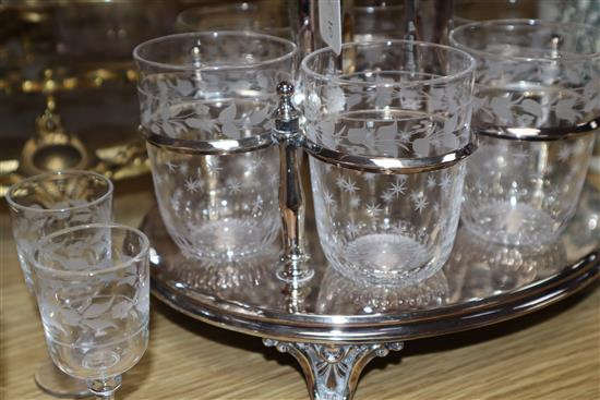 An ormolu and glass liqueur stand and a plated toddy stand